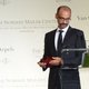 Author Junot Diaz accepts an award at the Norman Mailer Center’s Fifth Annual Benefit Gala on October 17, 2013, in New York City.